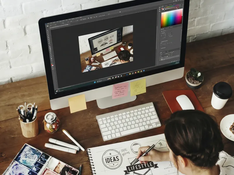 Designer sketching logo concepts