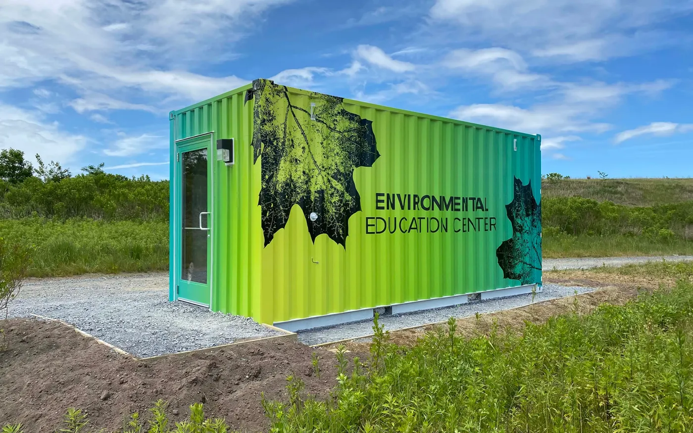 Wrapped Environmental Education Center container at Shirley Chisholm State Park