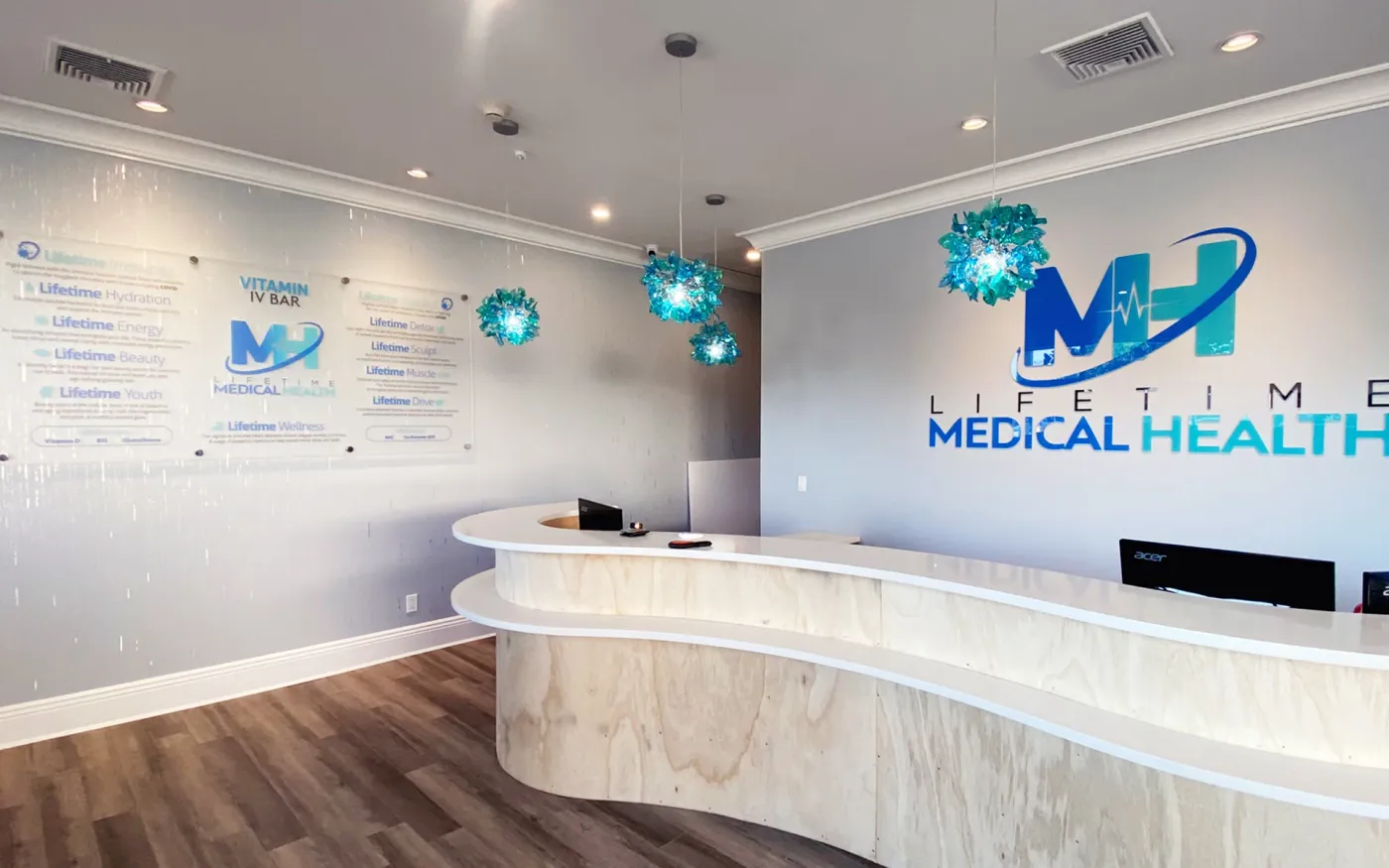 Lifetime Medical Health reception desk and branded wall signage by CL Visual