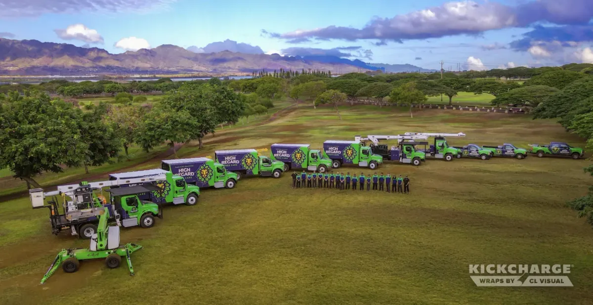High Regard Tree Care fleet of trucks and bucket trucks wrapped by CL Visual, with the crew