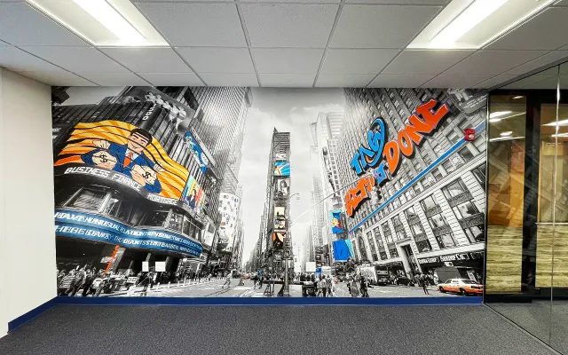 TAG corporate office Times Square mural with the words Get It Done