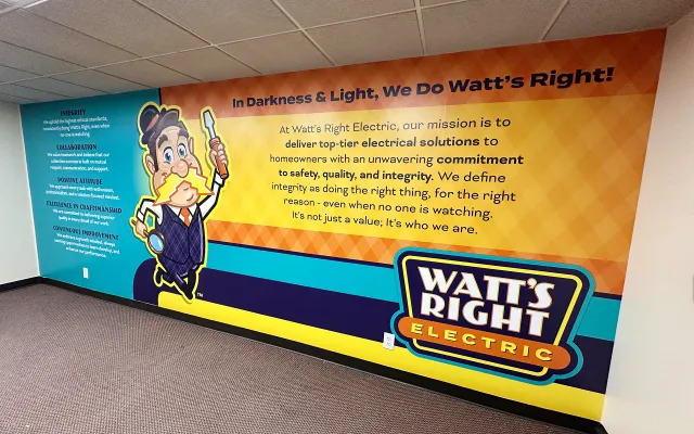 Watt's Right Electric mission and values wall mural with mascot and logo